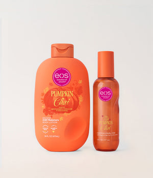 A bottle of EOS Pumpkin Chai body lotion and a matching pump bottle of EOS Pumpkin Chai conditioner, both in orange packaging, on a light gray background.