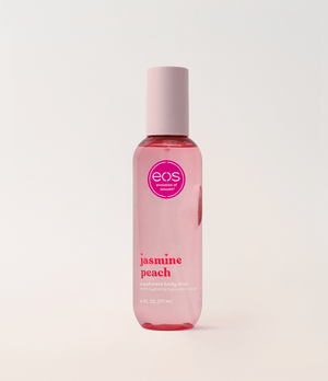 EOS Jasmine Peach body mist bottle on a light pink background
