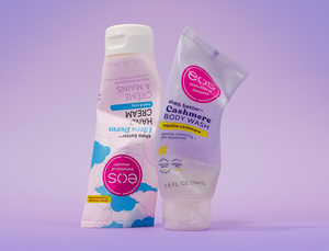 Two bottles of eos products on a purple background