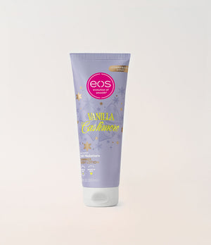 A lavender tube of EOS Vanilla Cashmere moisturizing body lotion, featuring a pink circular logo and gold lettering, set against a clean off-white background.