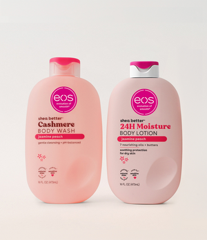 Two bottles of eos shea butter body wash and lotion on a white background