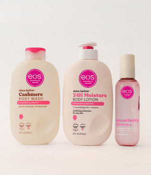 Three eos Strawberry Dream products including body wash, lotion, and serum on a white background
