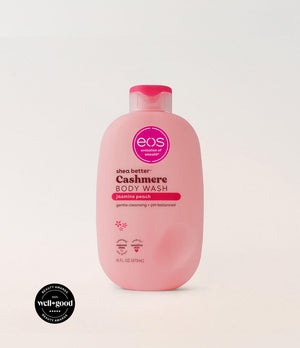 Pink bottle of eos Cashmere Body Wash on a light gray background