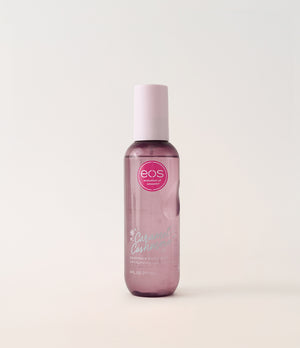 EOS body mist bottle on a light pink background