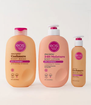 A set of three EOS shower essentials products, including body wash, body lotion, and body oil, all in pink packaging.