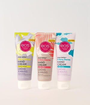Three tubes of eos hand cream on a white background
