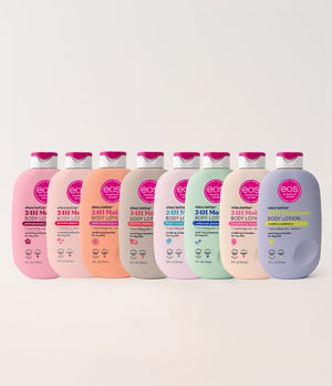 Row of eos body lotion containers on a white background