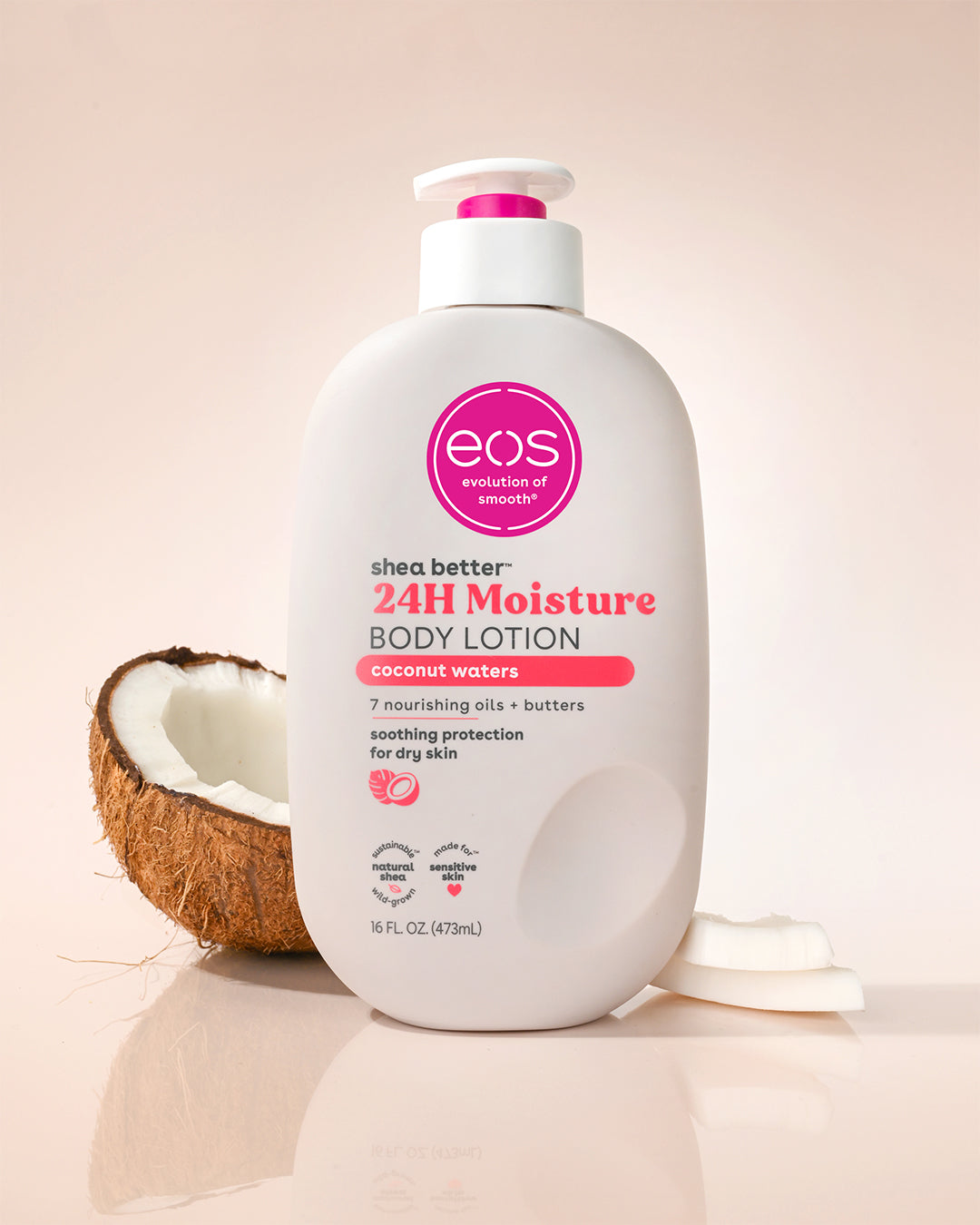 eos 24H Moisture body lotion with a coconut next to it on a beige background